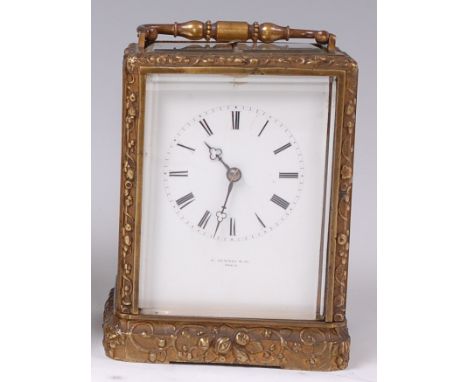 A late 19th century French gilt brass repeating carriage clock, the white enamel dial signed J Sewell & Co Paris, the movemen