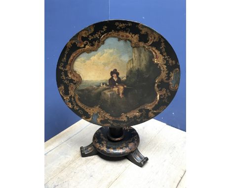Early Victorian hand painted lacqured papier mache tilt top tripod table, decorated with a goatherd. Stamped with the Royal C
