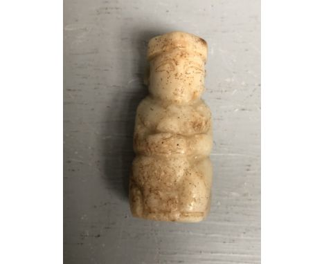 Early carved jade figure with a vertical hole running through it 5.1 cm 