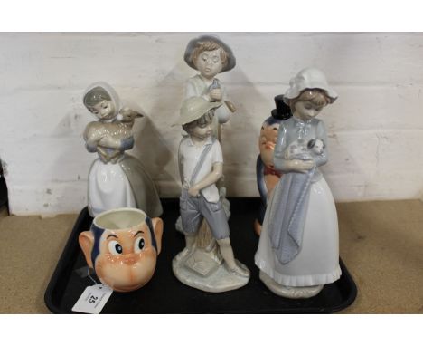 Four Lladro Nao figurines plus two Goebel monkey figures