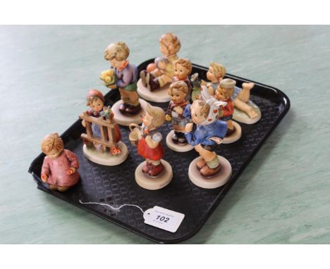 A tray of ten Goebel figures including editions from the Hummel Club