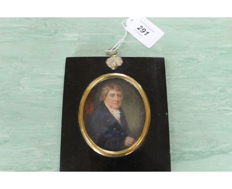 An 18th Century portrait miniature on ivory of a gentleman in an ebony frame, frame size 5 3/4" x 4 3/4"