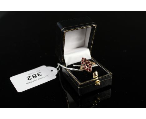 A 9ct gold garnet navette shaped ring, size K 1/2, approx 2.5g