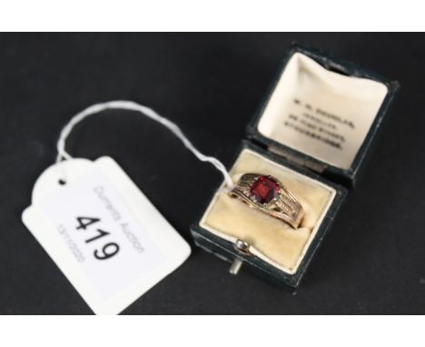 A 9ct gold garnet set ring, size Q 1/2, approx 3g