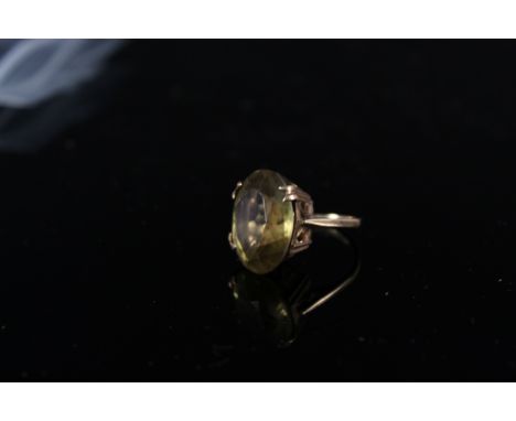 A 9ct gold ring set with a large quartz stone, size N, approx 7.5g