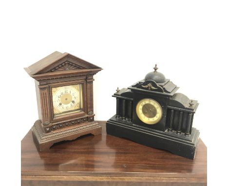 Late 19th century oak architectural cased mantle clock with twin train 'Junghans' movement, and a Victorian black slate mantl