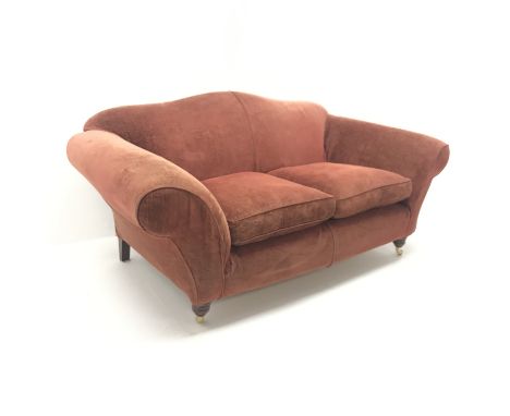 Multi-York three seat sofa, shaped back, scrolling arms, turned supports on castors, W185cm Condition Report Click here for f