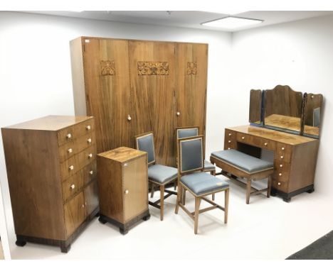 Art Deco walnut and marquetry bedroom suite by Gaylayde, comprising of an oak lined triple wardrobe, three doors enclosing fi