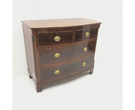 19th century mahogany bow front chest, two short and two long drawers, canted and fluted corners, shaped bracket supports, W1