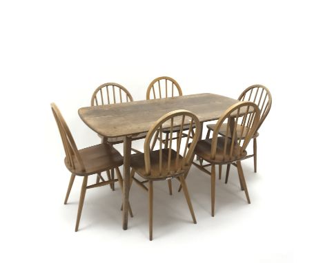 1950s Ercol rectangular dining table, square tapering supports (W137cm, H71cm, D71cm) and set six stick back chairs, turned s