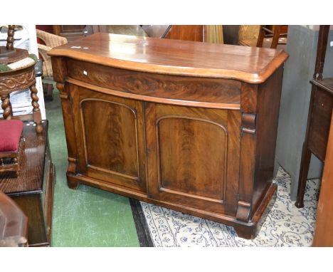 A Victorian mahogany chiffonier base, shaped top, long drawer over two arched panel doors, bracket feet