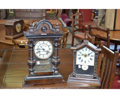 A late 19th century German architectural mantel clock, made in Baden, for Fattorini & Sons, Bradford, domed arched pediment, 