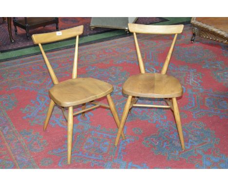 A pair of 1960's Ercol style elm and beech chairs (2)