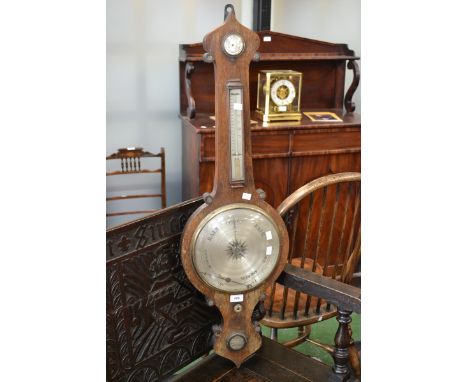 An oak wheel barometer
