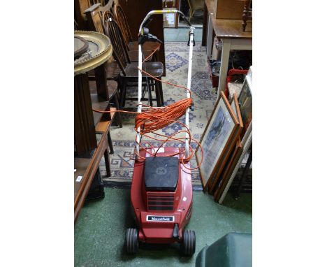 Garden tools - A Mountfield electric lawnmower.