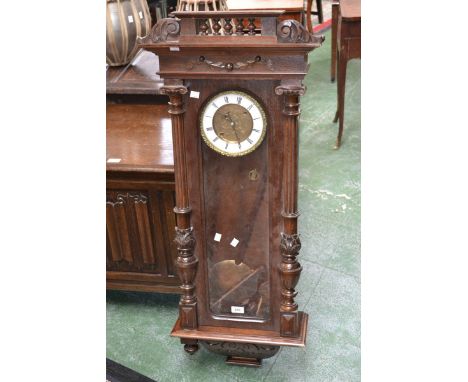 A late 19th century mahogany Vienna style wall clock, engraved brass dial, white enamel chapter ring, twin winding holes, Rom