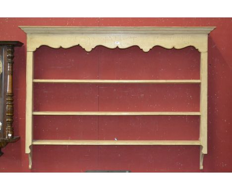 A painted three shelf pine plate rack