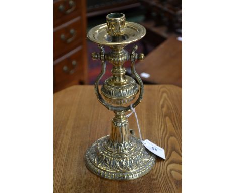 A brass ships gimbaled candlestick.