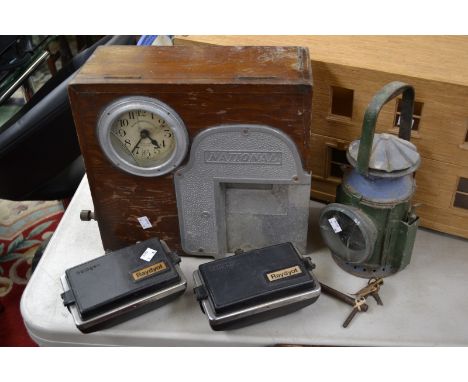 A vintage National Time Recorder, Aquinas Street, London clocking in machine, mahogany case; a Vintage lamp; two Raydot spot 