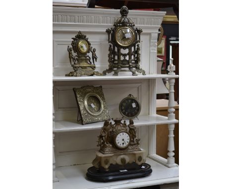 A late 19th century gilt metal figural mantel clock, marble base, oval ebonised plinth; a cast metal mantel clock; a presenta