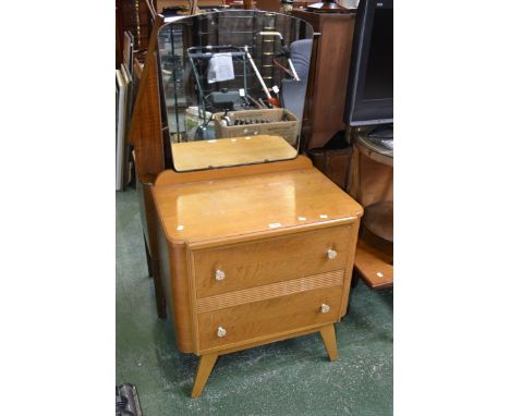 A 1950's light oak dressing chest.