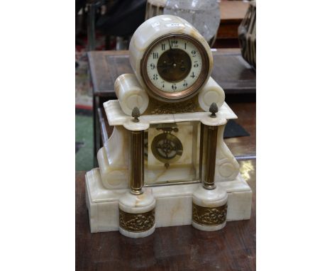 A late 19th century continental marble portico clock, circular dial, twin winding holes, Arabic numerals, cast brass Corinthi