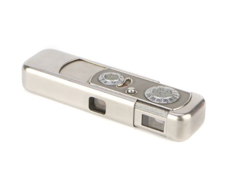 A Minox VEF Riga '12-Tooth' Camera, 1937-38, nickel, serial no. 02227, with Minostigmat f/3.5 15mm lens, body, G, shutter wor