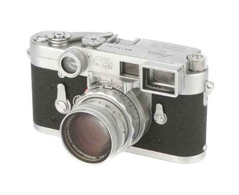 A Leica M3 DS Rangefinder Camera, 1956, chrome, serial no. 842353, with Leitz Summicron f/2 50mm Dual Range lens, 1957, chrom