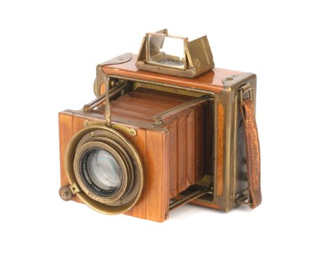 An Ernemann Tropen-Klapp 6.5x9cm Camera, 1922, teak, serial no. 1140414, with Ernamann Ernon f/3.5 120mm lens, serial no. 106