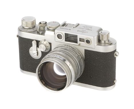 A Leica IIIg Rangefinder Camera, 1959, chrome, serial no. 956024, with Leitz Summarit f/1.5 50mm lens, 1957, chrome, serial n