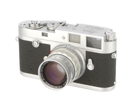 A Leica M2 Rangefinder Camera,  1958, button rewind, chrome, serial no. 939319, with Leitz Summicron f/2 50mm lens, rigid, ch