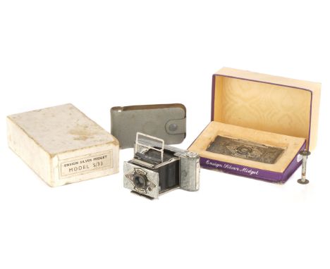 A Houghton-Butcher Ensign Midget Silver Jubilee S/33 Camera, 1935, silver, serial no. H15543, with Ensar f/6.3 lens, body, VG