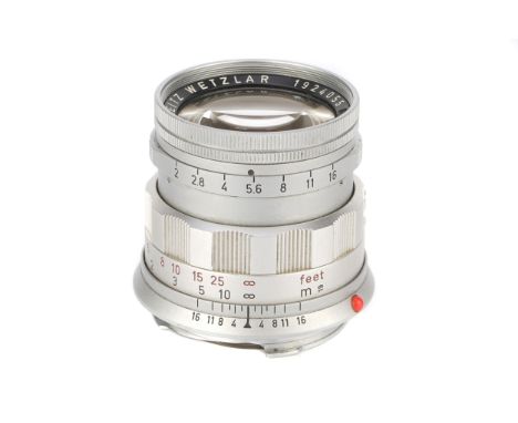 A Leitz Summicron f/2 50mm Lens, 1962, rigid, chrome, serial no. 1924055, body, VG, elements, G-VG, some light cleaning marks