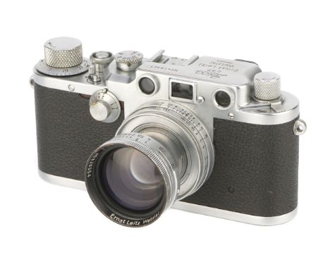 A Leica IIIc Rangefinder Camera, 1946/47, chrome, serial no. 419321, with Leitz Summitar f/2 50mm lens, 1946, chrome, serial 