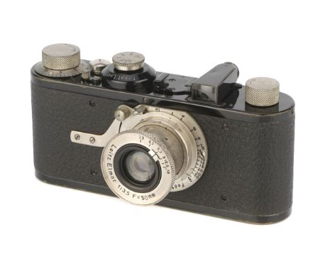 A Leica Ia Close Focus Camera, 1928, black/nickel, serial no. 10044, with Leitz Elmar f/3.5 50mm lens, body, VG, shutter work