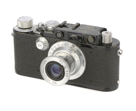 A Leica IIIf Rangefinder Camera, 1936, upgraded from III, black/chrome, serial no. 201071, with Leitz Elmar f/3.5 50mm lens, 