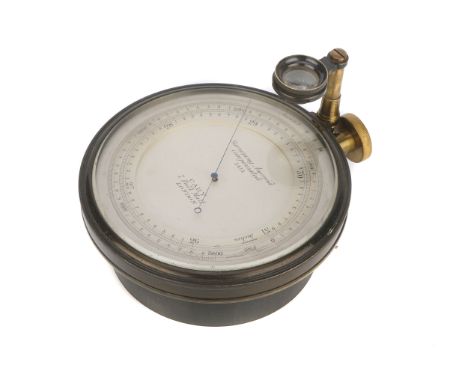 A Surveying Aneroid Barometer by Cary, in oxidised brass, graduated to 1/50th inch, with rotating outer scale of altitude 0-5