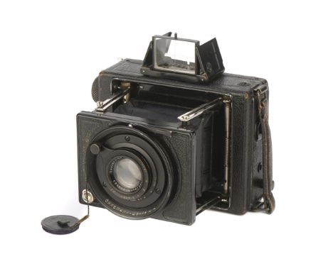 An Ernemann Klapp 6.5x9cm Camera, 1920-26, black, serial no. 1039734, with Carl Zeiss Jena Tessar f/4.5 120mm lens, serial no