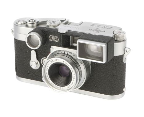 A Leica M3 DS Rangefinder Camera, 1954, chrome, serial no. 707139, with Leitz Summaron f/3.5 35mm lens, chrome, serial no. 15