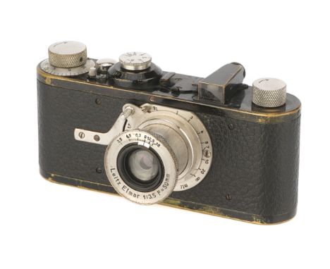 A Leica Ia Camera, 1928, black/nickel, serial no. 6311, with Leitz Elmar f/3.5 50mm lens, body, F-G, shutter working, lacking