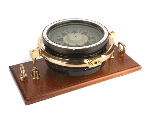 A Ship's Compass by Decca Arcus,  Danish, c.1930, fluid-filled  magnetic compass with brass gimbals and brass mounts, mounted