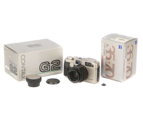 A Contax G2 Rangefinder Camera, 1996-97, titanium, serial no. 015968, with Carl Zeiss Vario Sonnar T* f/3.5-5.6 35-70mm lens,