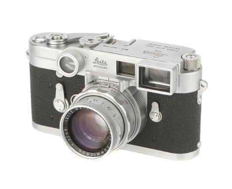 A Leica M3 DS Rangefinder Camera, 1955, chrome, serial no. 807306, with Leitz Summicron f/2 50mm Dual Range lens, 1960, chrom