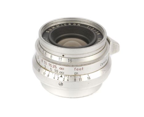 A Leitz Summicron f/2 35mm Lens, 1959, chrome, serial no. 1655647, body, G-VG, elements, VG, some light internal haze, with m