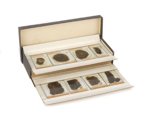 A Set of Microscope Coal Fossil Slides, English, c.1910, with labels for 'James Lomax Petrologist, Bolton', slides numbered f
