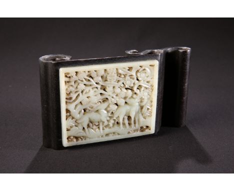 A CHINESE JADE MOUNTED HARDWOOD BRUSH REST, the pierced rectangular jade plaque carved with deer amidst prunus blossom, the h