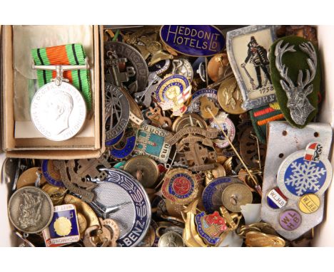 A LARGE COLLECTION OF MILITARY BADGES, ENAMEL BADGES, MEDALS AND BUTTONS, including a pocket watch. (Approx. 220)