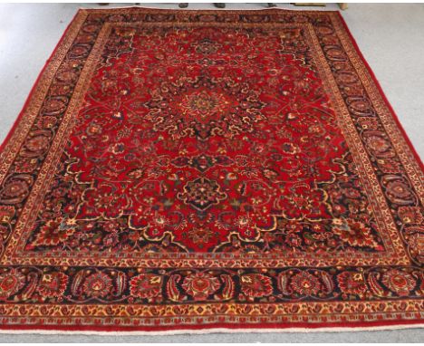 A LARGE PERSIAN HAND-KNOTTED CARPET. 388cm by 290cm