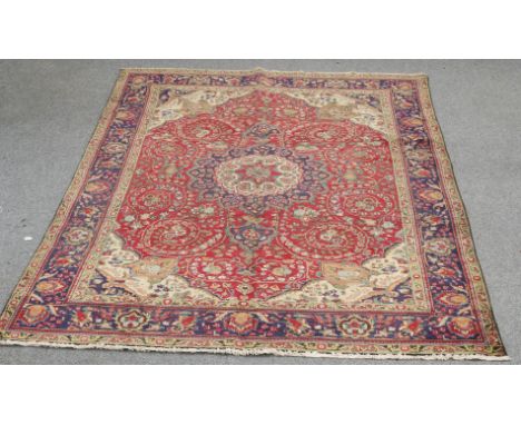 A TABRIZ CARPET. 281cm by 199cm