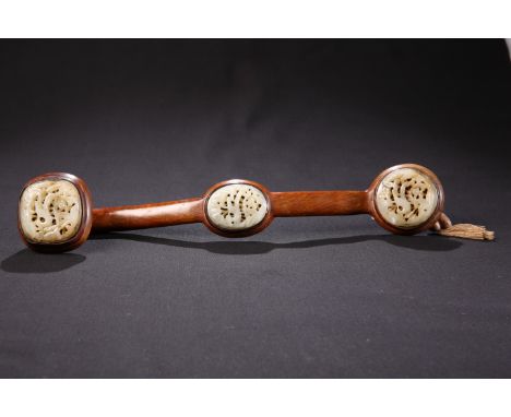 A CHINESE JADE MOUNTED HARDWOOD RUYI SCEPTRE, applied with three carved and pierced jade panels, each carved with bird and fo